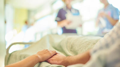 Patients Holding Hands