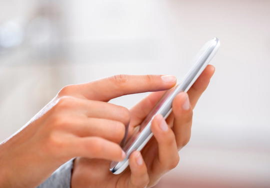 Someone Using A Smartphone